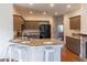 Spacious kitchen with granite countertops and island at 1630 Victoria Chase, Cumming, GA 30041