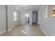 Spacious finished basement with tile flooring and multiple access points at 1883 La Mesa Ln, Decatur, GA 30032