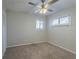 Spacious bedroom with large window and ceiling fan at 1883 La Mesa Ln, Decatur, GA 30032