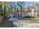 Front view of a renovated ranch home with driveway at 1883 La Mesa Ln, Decatur, GA 30032