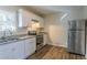 Modern kitchen with stainless steel appliances and granite countertops at 1883 La Mesa Ln, Decatur, GA 30032