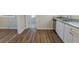 Newly renovated kitchen with hardwood floors and white cabinets at 1883 La Mesa Ln, Decatur, GA 30032