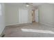 Main bedroom with walk-in closet and carpet flooring at 1883 La Mesa Ln, Decatur, GA 30032