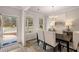 Bright dining room with a table for six and hardwood floors at 566 Abbott Se Ct, Atlanta, GA 30354