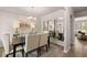 Elegant dining room featuring a chandelier and hardwood floors at 566 Abbott Se Ct, Atlanta, GA 30354