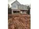 Two story home with gray siding and brick accents at 566 Abbott Se Ct, Atlanta, GA 30354