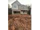 Two story house with gray siding and brick accents at 566 Abbott Se Ct, Atlanta, GA 30354