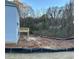 Elevated wooden deck overlooking a partially landscaped backyard at 566 Abbott Se Ct, Atlanta, GA 30354