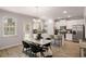 Modern kitchen with white cabinets, granite countertops, and stainless steel appliances at 566 Abbott Se Ct, Atlanta, GA 30354