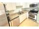 Updated kitchen with stainless steel appliances and granite countertops at 6980 Roswell Rd # E1, Sandy Springs, GA 30328