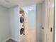 Stacked washer and dryer in a dedicated closet at 6980 Roswell Rd # E1, Sandy Springs, GA 30328