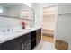 Double vanity bathroom with a large mirror and walk-in closet at 3377 Phillip Cir, Decatur, GA 30032