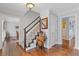 Hardwood floors and staircase in entryway at 4812 Riveredge Dr, Peachtree Corners, GA 30096