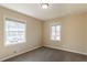 Bright bedroom with neutral walls and carpet at 3018 Meadowview Se Dr, Atlanta, GA 30316