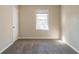 Well-lit bedroom with carpet and window at 3018 Meadowview Se Dr, Atlanta, GA 30316