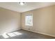 Spacious bedroom with wall-to-wall carpet and large window at 3018 Meadowview Se Dr, Atlanta, GA 30316