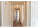 Long hallway with wood flooring and doors at 3018 Meadowview Se Dr, Atlanta, GA 30316