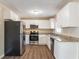 Updated kitchen with stainless steel appliances and granite countertops at 3018 Meadowview Se Dr, Atlanta, GA 30316