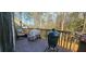 Wooden deck featuring an outdoor kitchen, furniture and a grill, perfect for entertaining guests at 553 Stonemill Mnr, Lithonia, GA 30058