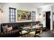 Breakfast nook with a black leather banquet and glass table at 2061 Telfair Ne Cir, Atlanta, GA 30324