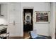 Modern powder room with a round mirror and dark vanity at 2061 Telfair Ne Cir, Atlanta, GA 30324