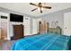 Spacious bedroom with large bed, dresser, and TV at 300 Orchard Dr, Temple, GA 30179