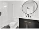 Modern bathroom with a walk-in shower, toilet and floating vanity at 350 Jayne Ellen Way, Alpharetta, GA 30009