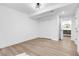 Basement bedroom with wood-look floors and access to a full bathroom at 350 Jayne Ellen Way, Alpharetta, GA 30009