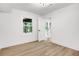 Basement bedroom with exterior access and a large window at 350 Jayne Ellen Way, Alpharetta, GA 30009