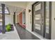 Modern front entry with dark gray door and wood accent wall at 350 Jayne Ellen Way, Alpharetta, GA 30009