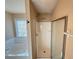 Bathroom with shower/tub combo and tile floor at 1563 Nicole Ridge Ct, Loganville, GA 30052