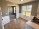 Cozy breakfast nook with tile floor and window at 1563 Nicole Ridge Ct, Loganville, GA 30052