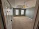 Large main bedroom with tray ceiling and carpet at 1563 Nicole Ridge Ct, Loganville, GA 30052