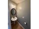 Simple powder room with pedestal sink at 1563 Nicole Ridge Ct, Loganville, GA 30052