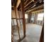 Under construction home's interior framing with exposed beams and wiring at 1739 Carter Cir, Atlanta, GA 30344