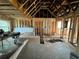 Under construction home's interior framing with exposed beams and wiring at 1739 Carter Cir, Atlanta, GA 30344