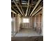 Under construction home's interior framing with exposed beams and wiring at 1739 Carter Cir, Atlanta, GA 30344