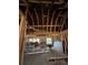 Under construction home's interior framing with exposed beams and wiring at 1739 Carter Cir, Atlanta, GA 30344