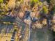 Aerial view showing house, barns and 2 car garage at 1921 W Hightower W Trl, Conyers, GA 30012