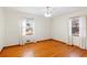 Spacious bedroom with hardwood floors and ample natural light at 1921 W Hightower W Trl, Conyers, GA 30012