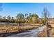 View of pasture with horses and trees at 1921 W Hightower W Trl, Conyers, GA 30012