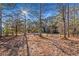 Open pasture with trees and a split rail fence at 1921 W Hightower W Trl, Conyers, GA 30012