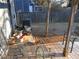 Wooden deck and fenced backyard with potted plants at 390 Lakeridge Ct, Riverdale, GA 30274