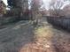 Grass backyard with wooden fence at 390 Lakeridge Ct, Riverdale, GA 30274