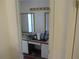 Clean bathroom with double vanity and mirrors at 390 Lakeridge Ct, Riverdale, GA 30274