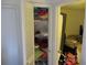 Neat linen closet with shelving for storage at 390 Lakeridge Ct, Riverdale, GA 30274