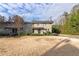 Two-story tan house with dark brown trim, front door, and walkway at 4060 Haverhill Ne Dr # F, Atlanta, GA 30342