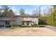 Two-story tan house with dark brown trim, front door, and walkway, light dusting of snow at 4060 Haverhill Ne Dr # F, Atlanta, GA 30342