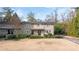 Two-story tan house with dark brown trim, front door, and walkway at 4060 Haverhill Ne Dr # F, Atlanta, GA 30342