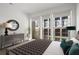 Bright bedroom with large windows and city views at 775 Juniper Ne St # 413, Atlanta, GA 30308